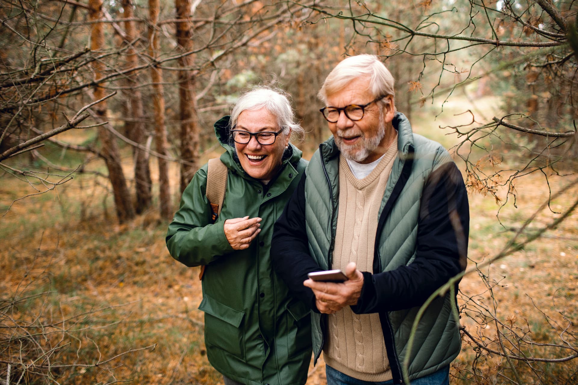 A couple smiling together outdoors
